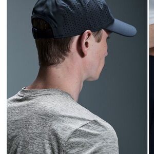 On lightweight running cap in navy.